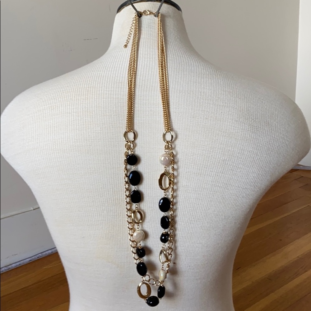 Gold and black and white necklace